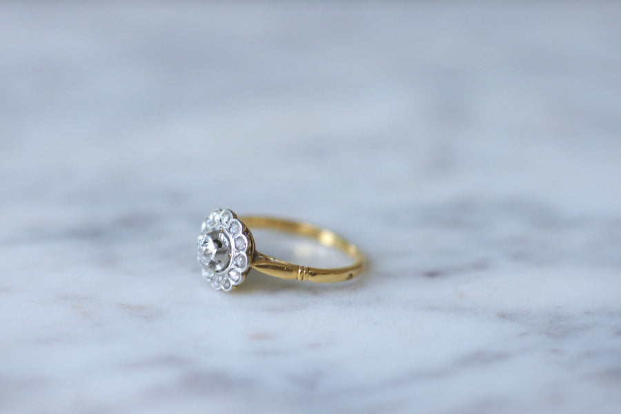 Gold, platinum and diamond daisy ring, early 20th century