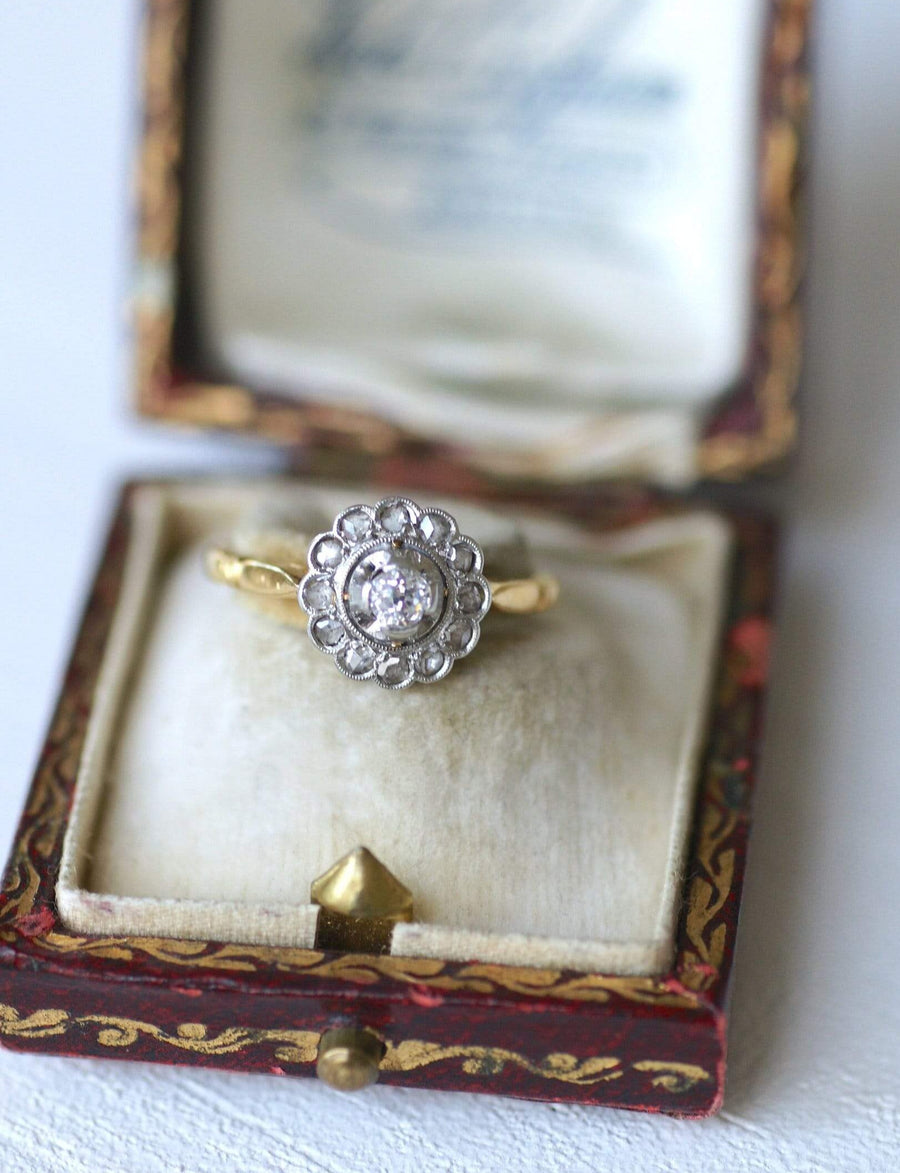 Gold, platinum and diamond daisy ring, early 20th century