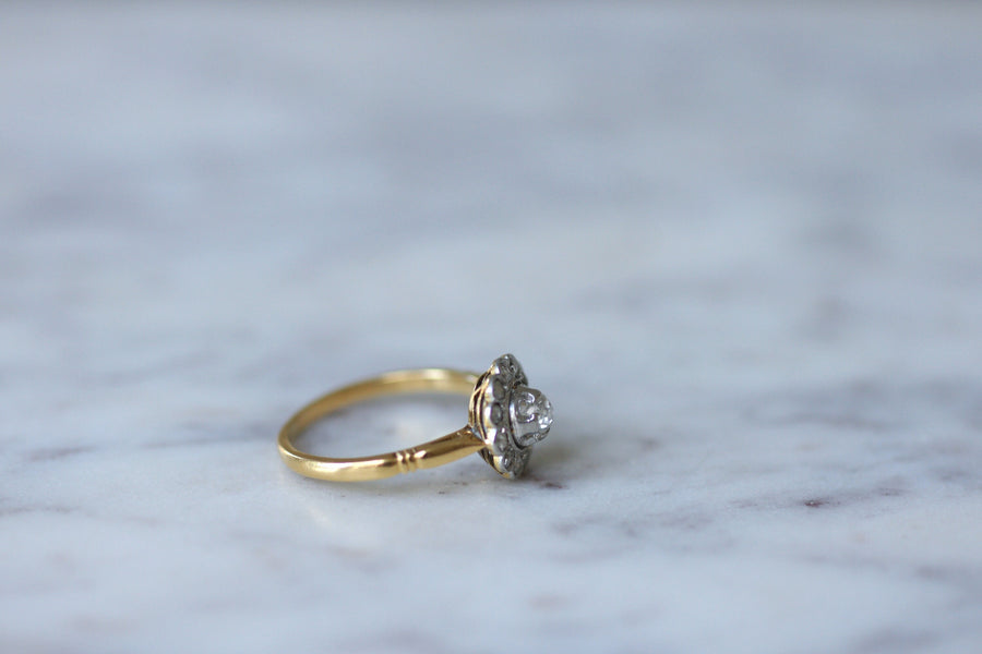 Gold, platinum and diamond daisy ring, early 20th century