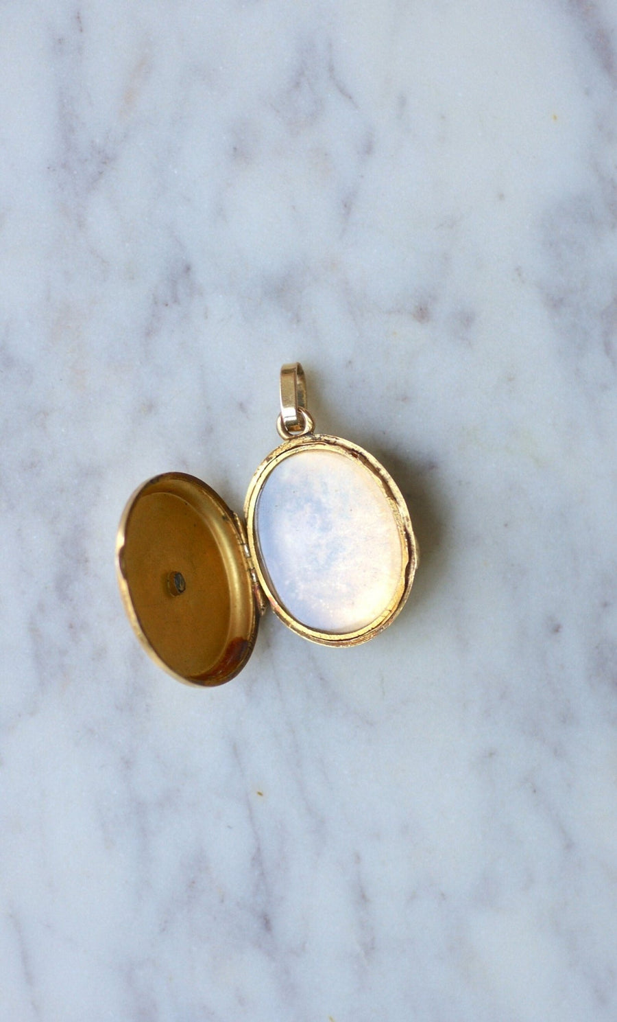 Cross opening medallion with pearls on gold - Galerie Pénélope