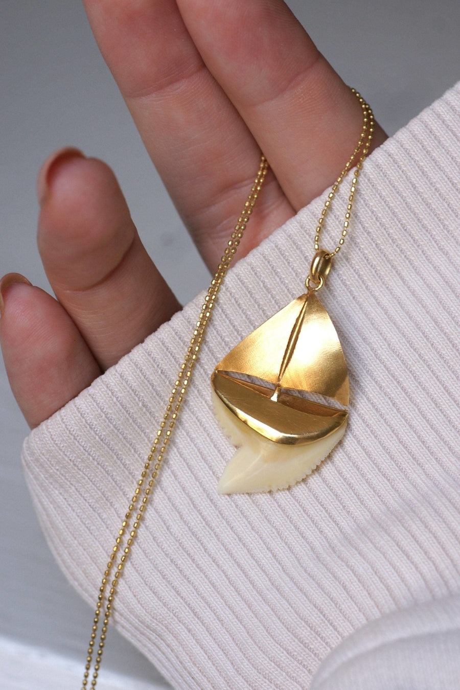 Shark tooth sailboat pendant on gold - Penelope Gallery